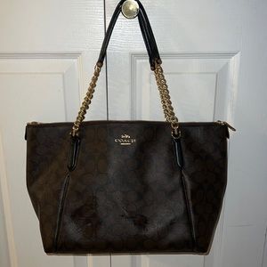 Used black, brown and gold Coach purse